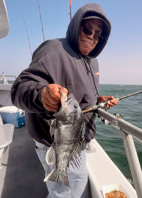 Keeper Rockfish and Limits of Sea Bass - Ocean City MD Fishing